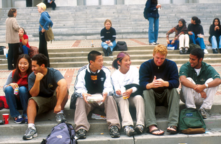 Students talking about things much more interesting than some girl you miss.
